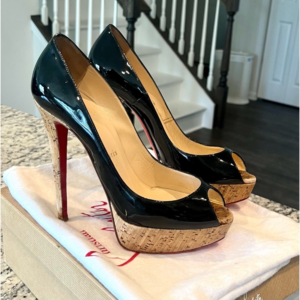 Authentic Christian Louboutin peep toe banana 140 patent calf/cork black heels.